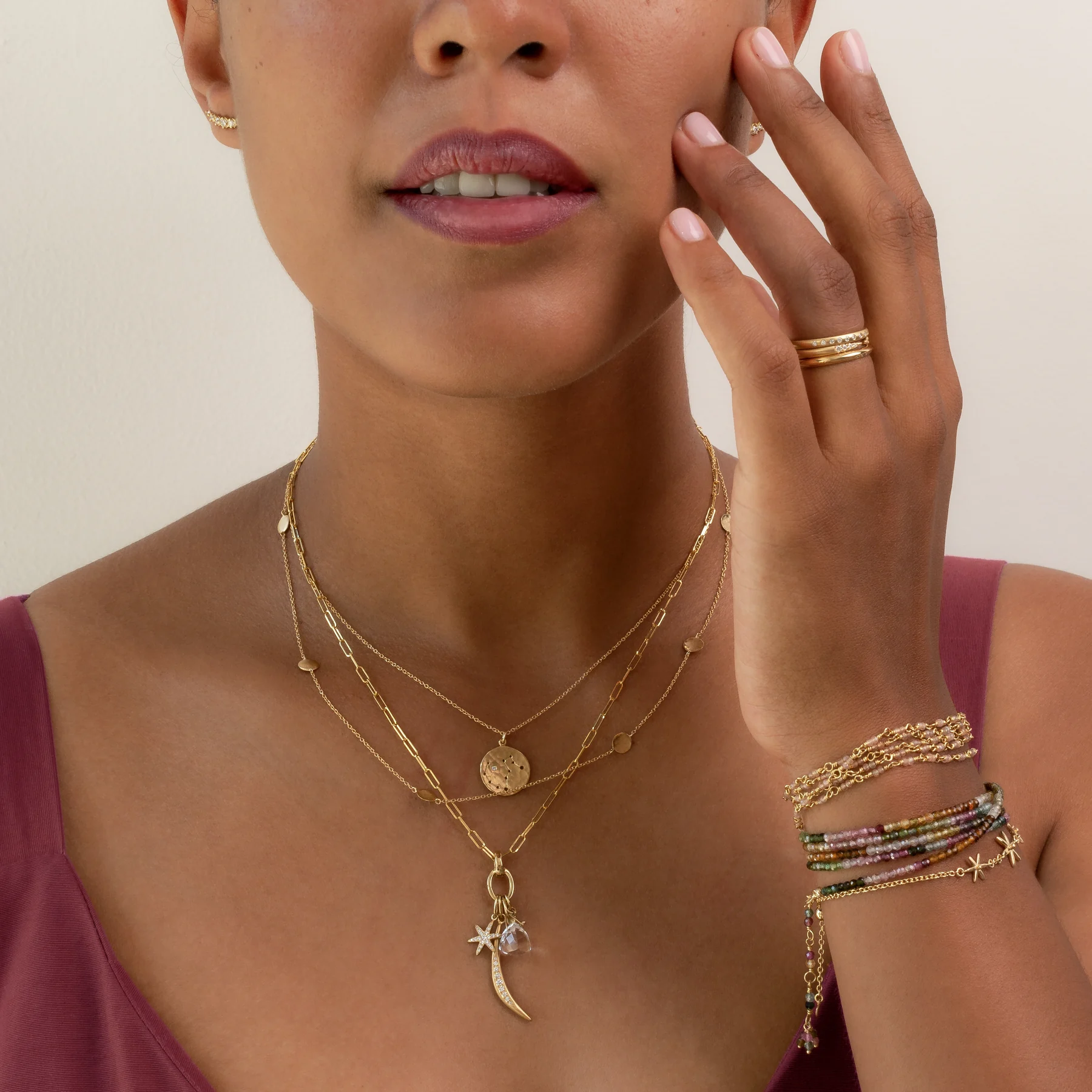 Watermelon tourmaline jewellery and gold charms
