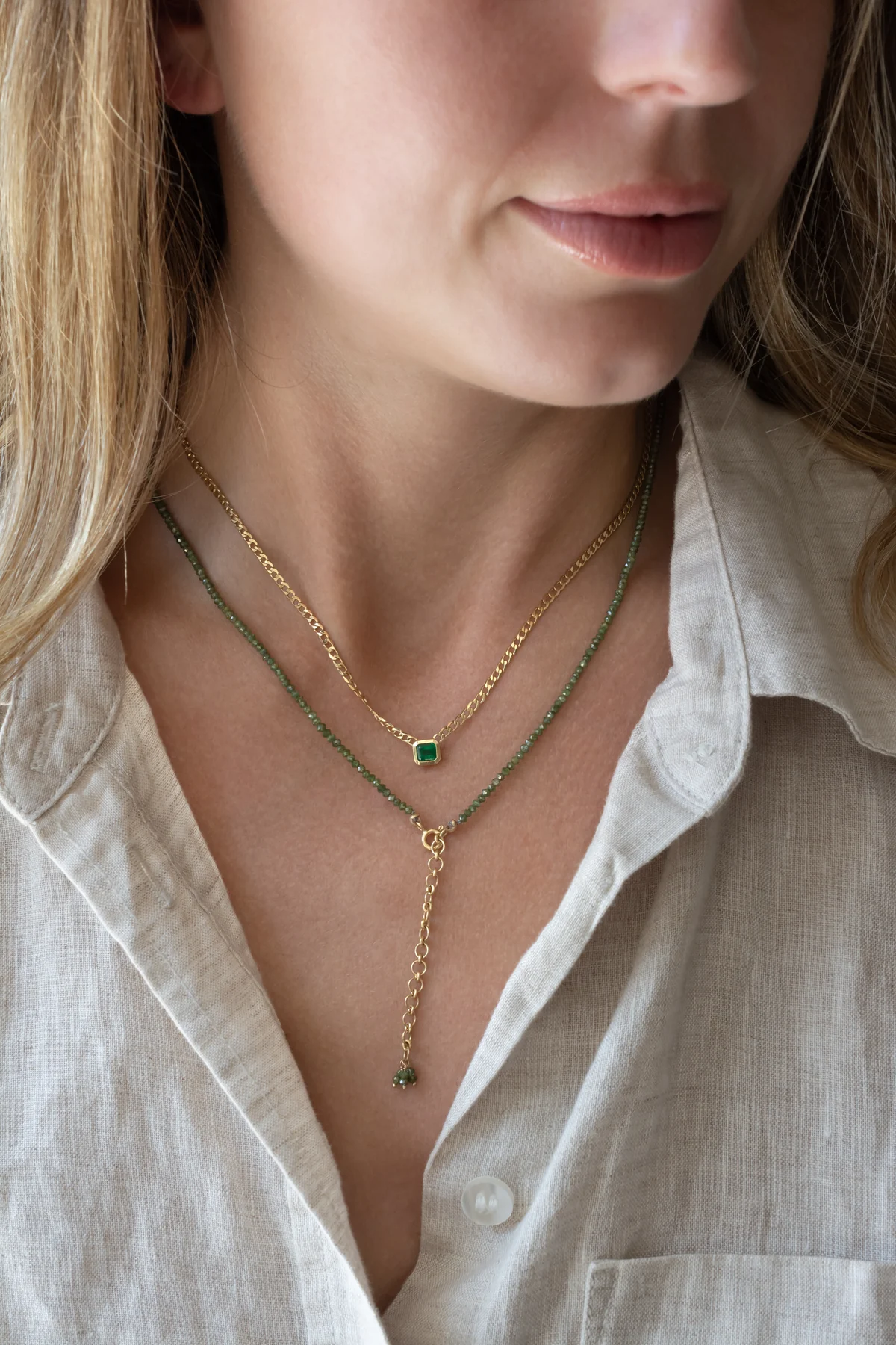 Green diamond bracelet and gold necklace