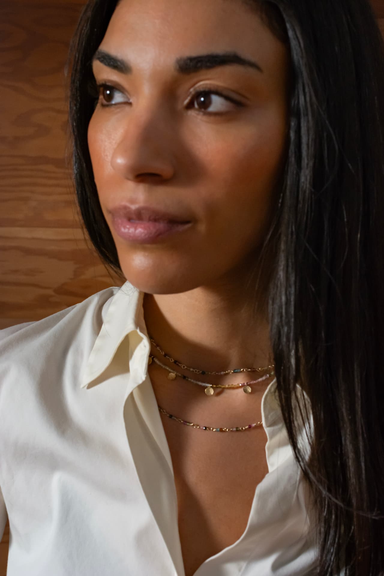 Watermelon tourmaline necklaces styled with a white shirt